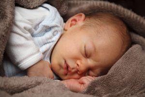 baby-boy-sleeping-in-blanket